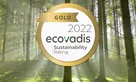 Mersen Gold EcoVadis medal with a forest in the background