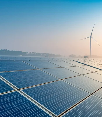 solar field with a wind turbine 